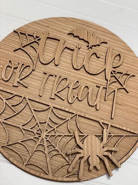 Trick or Treat  Door Hanger Laser Cut / Engraved Wooden Blank - 3D pieces for 16 sign NO ROUND INCLUDED #LaserCutWood #LaserCutAcrylic #LaserCutMetal #LaserCuttingDesign #LaserCrafting Laser Cut Wood Projects, Engraver Projects, Door Rounds, Engraver Ideas, Laser Cut Wood Jewelry, Laser Engraved Wedding, Cnc Machine Projects, Laser Crafts, Halloween Cricut