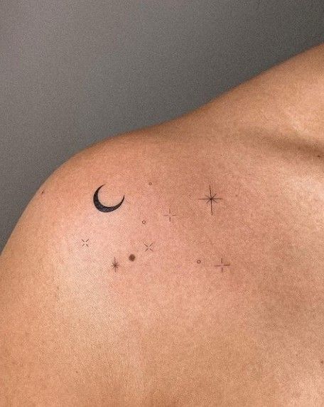 Moon Tattoo On Shoulder For Women, Micro Shoulder Tattoo, Shoulder Moon Tattoos For Women, Small Universe Tattoo, Tattoo Ideas Female Moon, Tattoo Ear, Small Lotus Tattoo, Small Moon Tattoos, Universe Tattoo