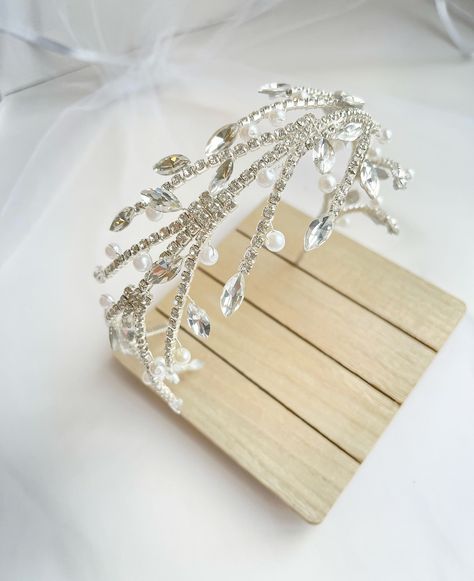 Elegance defined: Crystals, rhinestones, and pearls come together in this stunning bridal headband, perfect for your special day.”✨✨❤️ #bridalaccessories #bridalheadband #bridalheadpiece #yeghandmade #canadahandmade #bridemaids #weddingcrown Crystal Headband Wedding, Headband Bridal, Crystal Headband, Wedding Headband, Wedding Crown, Bridal Headband, Bridal Headpieces, Hair Piece, Accessories Necklace