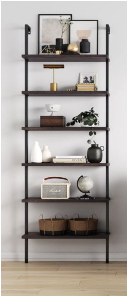 Black Ladder Shelves, Black Iron Shelves Living Room, Tall Black Bookshelf, Ladder Shelving Ideas, Industrial Ladder Shelf, Tall Wall Shelves, Black Ladder Shelf Decor, Nathan James Bookshelf, Apartment Japandi