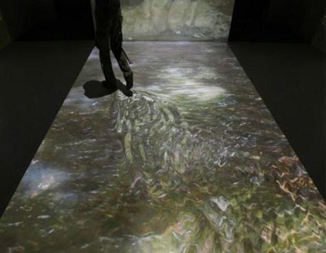 Visitor walks on a floor with a projection resembling water - | The Economic Times Floor Projector, Water Projection, Laughing Horse, Interactive Projection, Digital Projection, Sensory Rooms, Interactive Walls, Corporate Event Planning, Led Dance