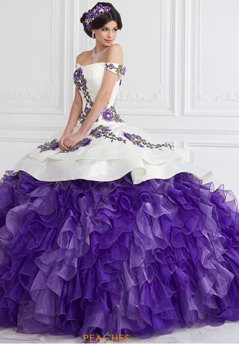 Absolutely gorgeous LA Glitter quinceanera dress 24064 showcases an off the shoulder neckline and contrasting ruffled skirt. Complete with a stunning bodice adorned with eye catching floral appliques and a lace up closure to cinch your waist and accentuate the dramatic ruffle organza skirt, you're sure to make a statement with this show stopping gown. Shop many more Tiffany Quinceanera gowns at Peaches Boutique Chicago. Quince Dresses Off The Shoulder, Dark Purple Quinceanera Dresses, Purple Quinceanera, Vestido Charro, Purple Quince, Mexican Quinceanera Dresses, Charro Quinceanera Dresses, Purple Quinceanera Dresses, Corset Dresses