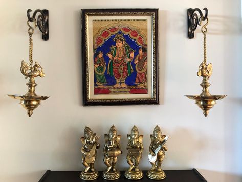 Brass home decor Brass Decor Indian Pooja Room, Brass Idols Indian Homes, Hanging Diyas In Pooja Room, Brass Decor Indian Living Rooms, Indian Brass Decor, Brass Decor Indian, Dance Room Decor, Hanging Diya, Brass Wall Decor