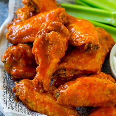 Baked Buffalo Wings - Dinner at the Zoo Franks Hot Sauce, Baked Hot Wings, Baked Buffalo Wings, Crispy Baked Chicken Wings, Wings Recipe Buffalo, Hearty Snacks, Homemade Buffalo Sauce, Crispy Chicken Wings, Crispy Baked Chicken