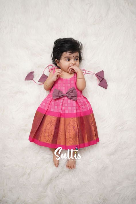 Frock-tastic Fashion: Adorable Styles for Little Fashionistas Kids Pattu Pavadai Designs Latest, Silk One Piece, Pavadai Sattai Designs, Traditional Baby Dresses, Pattu Pavadai Designs, One Piece Frock, Baby Dress Tutorials, Sweater Designs, Kids Ethnic Wear