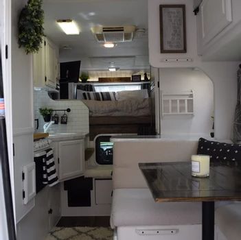 Truck Camper Remodel Exterior, Rv Bed Above Cab Remodel, Truck Bed Camper Renovation, Truck Camper Organization Ideas, Renovated Truck Camper, Slide In Camper Remodel Interiors, Lance Truck Camper Remodel, Lance Camper Makeover, Truck Camper Organization