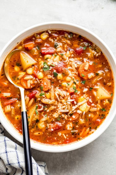 Hearty vegetable soup with orzo, corn, and potatoes. #vegetableorzosoup #vegetablesoup #vegetarian Vegetable Orzo Soup, Soup With Orzo, Vegetable Orzo, Corn And Potatoes, Chunky Soup, Veggie Soup Recipes, Orzo Soup Recipes, Lenten Recipes, Hearty Vegetable Soup