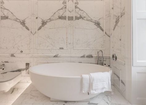 Statuario Marble full clad bathroom including floor & walls. Beautifully Bookmatched throughout with   a herringbone floor & border, moulded frame profiles on all walls & thick solid dado rail all hand finished in a London Mayfair mansion by Livra uk ltd #statuario #marble #london #livra #bookmatch #dado #moulding #profile #herringbone #marbleframes Marble Moulding Bathroom, Mansion Bathrooms Luxury, Statuario Marble Bathroom, Bespoke Cabinetry, Pool House Bathroom, Marble Worktop, London Homes, London Mansion, Luxury Master Suite