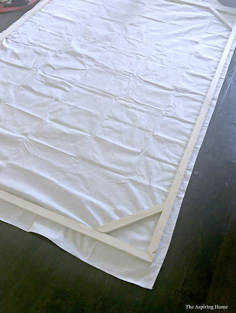 Build a Giant DIY Canvas Frame Using a Drop Cloth | The Aspiring Home Diy Modern Headboard, Plaster Art On Canvas, Large Art Pieces, Diy Canvas Frame, Diy Frame Ideas, Drop Cloth Projects, Cloth Projects, Giant Canvas, Inexpensive Art