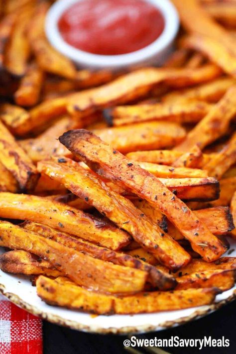 Air Fryer Sweet Potato Fries are seasoned with paprika and other spices, then air-fried to a golden crisp. #sweetpotatofries #airfryerrecipes #airfriersweetpotatofries #sweetandsavorymeals #sidedishes Sweet Potato Fries Air Fryer, Air Fryer Sweet Potato Fries, Making Sweet Potato Fries, Frozen Sweet Potato Fries, Crispy Sweet Potato Fries, Freeze Sweet Potatoes, Sweet Potato Recipes Fries, Crispy Sweet Potato, Savory Meals