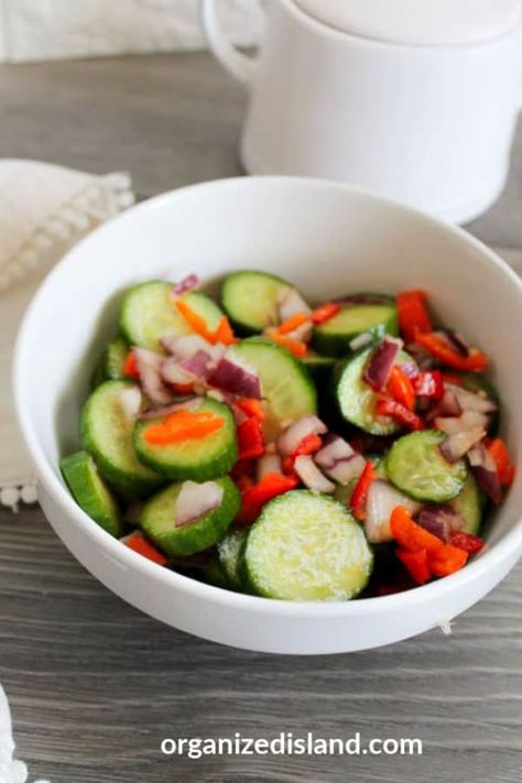 This Asian Cucumber Salad is a colorful summer salad marinated in a sesame ginger dressing. So good for dinners, potlucks and picnics and comes together in just minutes. Sesame Ginger Dressing, Asian Cucumber Salad, Favorite Casseroles, Classic Salad, Seasonal Salad, Sesame Ginger, How To Wash Vegetables, Ginger Dressing, Baked Dessert Recipes