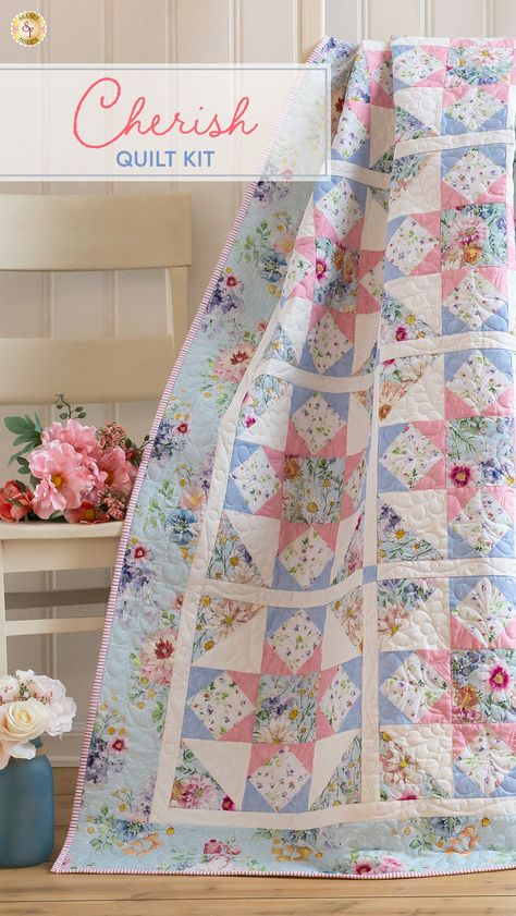 This soft and pretty quilt was designed by Shabby Fabrics using the Cherish fabric collection from Clothworks. The pleasing shades of blue, pink, and cream as well as the simply pieced blocks gives the overall effect of comfort and beauty, making this quilt a cherished addition to any home! Finishes to approximately 48.5 x 61.5. Beautiful Quilts Inspiration, Shabby Fabrics Tutorials, Pink And Blue Quilts, Pink Quilt, Pink And Blue Quilt, Pink And Blue Quilts Ideas, Shabby Chic Quilt Patterns, Scrap Quilt, Irish Chain Quilt Pattern