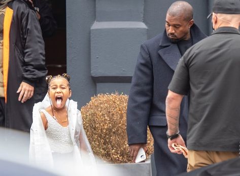 North West Sticks It to Photogs With Her Tongue in the U.K. with Kanye West North West Kim Kardashian, London Weekend, Kardashian Kids, Long Brunette, Unfortunate Events, London Today, Black Celebrities, A Series Of Unfortunate Events, Hollywood Life