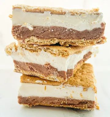 Frozen Smores Bars, Frozen S’mores, S’mores Chewy Cookie Bars, S’mores With Marshmallow Fluff, Frozen Smores, S’mores Magic Bars, Marscapone Cheese, Smores Bar Recipe, Cracker Flavors