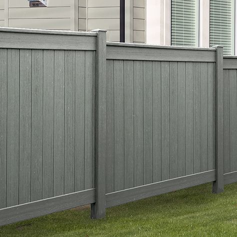 I love the grey color of this PVC fence. The color and design make it look very contemporary. My husband and I are considering getting a fence like this to give us privacy in our home and to give our backyard a more modern look. Pvc Privacy Fence, Grey Backyard Fence, Grey Wood Fence, Gray Fence Ideas, Gray Fence Backyard, Fence On Concrete, Backyard Fence Paint Color Ideas, Gray Fence, Fence Colors Painted