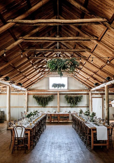 Rustic reception barn in NSW with exposed wooden beams, corrugated iron walls and wooden long table seating. Rustic Barn Wedding Reception, Farm Wedding Reception, Shed Wedding, Rustic Shed, Unique Wedding Receptions, Rustic Farm Wedding, Barn Wedding Reception, Country Barn Weddings, Rustic Wedding Table