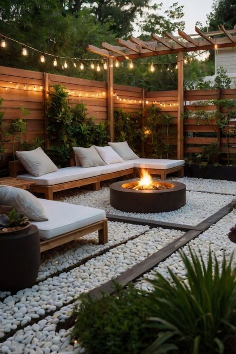 Cozy outdoor patio featuring a mini swimming pool and lush plants. All Gravel Backyard, Small Cozy Backyard Ideas, Backyard Ideas Simple, Fire Pit Ideas Backyard On A Budget, Backyard Fire Pit Ideas Lounge Areas, Backyard Lounge Area, Small Backyard Oasis, Transitional Backyard, Townhouse Backyard