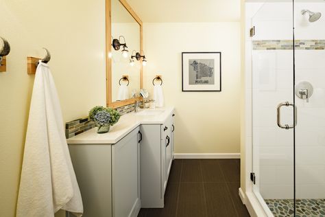 The blue-grey cabinets in this industrial chic bathroom compliment the glass tile work. Bathroom Industrial Chic, Traditional Bathroom Remodel, Small Basement Bathroom, Basement Bathroom Design, Basement Bathroom Remodeling, Add A Bathroom, Bathroom Plans, Small Basements, Basement Bedrooms