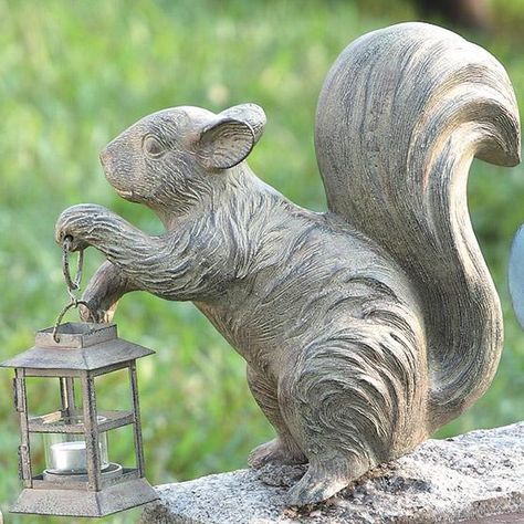 Squirrel Statue with Lantern. https://api.shopstyle.com/action/apiVisitRetailer?id=497935771&pid=uid8100-34415590-43 Garden Animal Statues, Nature Inspired Lighting, Tree Statues, Garden Lanterns, Tanah Liat, Garden Animals, Woodland Friends, Bird Statues, A Squirrel