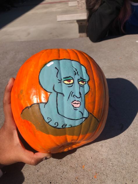 #squidward #pumpkin #halloween #handsomequidward #spongebob #cool #asthetic Gravity Falls Pumpkin Painting, Handsome Squidward Pumpkin, Squidward Pumpkin Carving, Squidward Pumpkin, Spongebob Pumpkin Painting, Spongebob Cool, Spongebob Pumpkin, Squidward Painting, Handsome Squidward