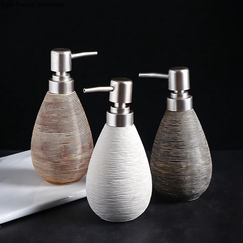 Elevate your bathroom with our Elegant Ceramic Lotion & Soap Dispenser. This versatile accessory serves as a stylish lotion bottle, shower gel container, or hand sanitizer dispenser, perfectly blending form and function. Made from high-quality ceramic, it features a sleek, modern design that complements any decor. Shop now at In Home Essentials to add a touch of sophistication to your bathroom routine! #bathroomdecor #ceramicdispenser #lotionbottle #soapdispenser #showergelcontainer #handsa... Hand Sanitizer Bottle, Bathroom Routine, Sanitizer Bottle, Lotion Containers, Hand Sanitizer Dispenser, Boho Contemporary, Old Bathroom, Creative Bathroom, Bath Accessories Set