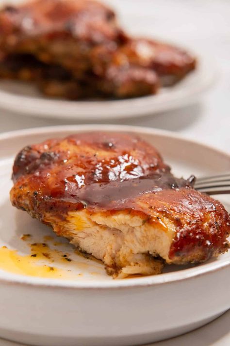 Love the flavors of BBQ chicken but don't always have time to grill? Enjoy weeknight BBQ with these oven-baked BBQ Boneless Chicken Thighs! Chicken Thigh Boneless Recipes, Boneless Bbq Chicken, Bbq Boneless Chicken Thighs, Oven Baked Bbq Chicken Thighs, Baked Bbq Chicken Thighs, Chicken Thighs Baked, Oven Baked Bbq Chicken, How To Make Bbq, Bbq Chicken Thighs