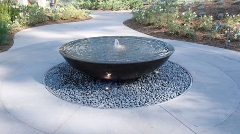 oasis. Modern Fountain Front Yard, Lighting From Below, Diy Concrete Bowl, Bowl Fountain, Contemporary Water Feature, Underwater Lighting, Modern Water Feature, Water Sculpture, Modern Fountain