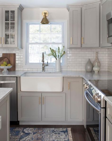 Sconces Over Kitchen Sink, Wall Mount Light Over Kitchen Sink, Gray Shaker Kitchen Cabinets, Light Over Kitchen Sink, Light Gray Kitchen, Kitchen Cabinets Design Ideas, Glass Upper Cabinets, Cabinets Design Ideas, Over Kitchen Sink