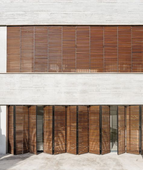 Large wooden shutters filter light and air into Mallorcan home by Company Studio Blind Inspiration, Blinds Inspiration, Stepping Stone Walkways, Spanish Practice, House Shutters, South Facing Garden, Canopy Shelter, Oak Wood Floors, Wooden Shutters