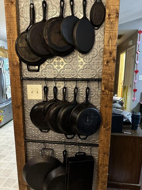 Cast Iron Rack Wall, Cast Iron Skillets On Wall, Cast Iron Cookware Storage, Display Cast Iron Skillets, Cast Iron Skillet Display Ideas, Cast Iron Wall Storage, Storing Cast Iron Cookware, Cast Iron Pan Wall Display, Cast Iron Hanging Ideas