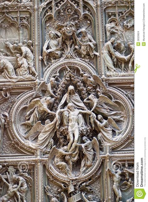 pandora's palace | Statue of angels and marry wall of duomo Cathedral in milano.