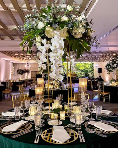 ANDI Soirées on Instagram: “Plenty of gorgeous greenery at tonight’s reception 💚 #ANDIsoirées #DevinAndJohn 📋: @andisoirees 📍: @1hotels 🌸: @parrishdesigns 📸:…” Green And Gold Table Centerpieces, Green Black And Gold Wedding, Gold Table Centerpieces, Wedding Reception Tables Centerpieces, Gold Wedding Centerpieces, Green And Gold Wedding, Party Like Gatsby, Tables Centerpieces, Black And Gold Wedding