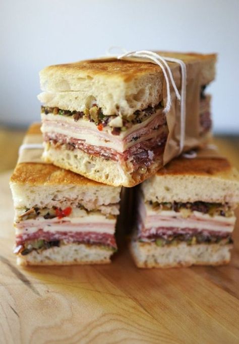 14 Fancy Sandwich Recipes That Are Worthy of the Dinner Table via Brit + Co Muffaletta Recipe, Muffaletta Sandwich, Picnic Sandwiches, Sandwich Bar, Burgers Sandwiches, Think Food, Snacks Für Party, Chapati, Soup And Sandwich