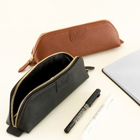 Pencil pouch⁠ Handcrafted with European vegan leather, YKk close around Zipper and lined with luxurious silk cloth on the inside to store your belongings.⁠ ⁠ Shop from https://atelierneorah.com/collections/pencil-pouch⁠ ⁠ #atelierneorah #neorah1969 #neorahpouch #handcrafted #artisan #veganfashion #veganlove #makeupbrushpouch #organizers #travelcompanion #stationaryaddict #learningisfun #schoollife #pencases #kidspouch #schoolpouch #pouchtravel #colourpouch #schoolove #kids #schoolessentials School Pouch, Vegan Italian, Pin Up Outfits, Pen Pouch, Vegan Fashion, School Essentials, Cross Patterns, Pencil Pouch, Pen Case