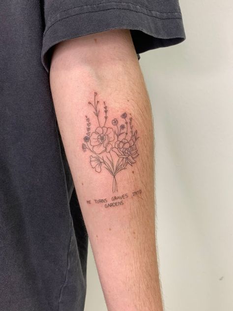 He turns grave into gardens | tattoo ideas by  Rey Goins He Turns Graves Into Gardens Tattoo, Grave With Flowers Tattoo, Graves Into Gardens Tattoo Ideas, Graves To Gardens Tattoo, Maverick City Tattoo, Song Lyric Tattoos Placement, Graves Into Gardens Tattoo, Maverick Tattoo, Dainty Tats