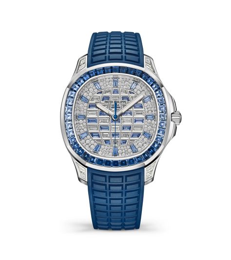 Patek Philippe combines "contemporary casual chic" design and Haute Joaillerie in a new white gold Aquanaut Luce model. The dial center is paved with baguette-cut diamonds and blue sapphires forming a checkerboard pattern recalling the Aquanaut collection’s emblematic pattern. The chapter ring alternates between baguette-cut blue sapphire hour-markers and snow-set brilliant-cut diamonds. The rounded octagonal bezel is enhanced by a row of baguette-cut sapphires set in a subtle gradient running f Iced Out Patek Phillipe, Phillipe Patek Watches, Patek Watches, Patek Philippe 5270, Patek Phillipe Aquanaut, Watches Silver, Philip Watch, Diamond Watches For Men, Patek Philippe Aquanaut