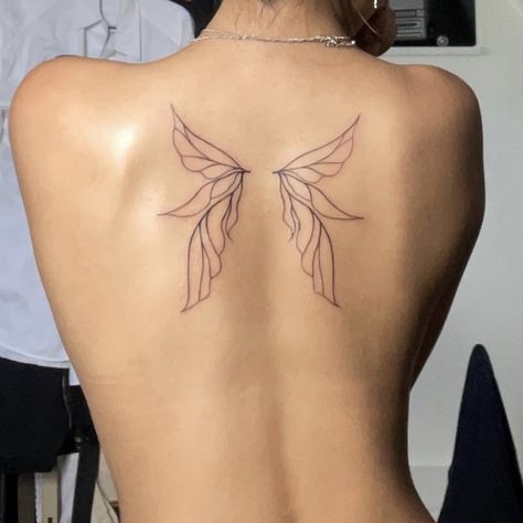 Fairy Wings Back Tattoo Aesthetic, Mini Fairy Wings Tattoo, Tiny Wings Tattoo On Back, Fair Wing Tattoo, Tattoo Upper Back Women, Simple Fairy Wings Tattoo, Fairy Wing Ear Tattoo, Spine Tattoos With Wings, Wing On Back Tattoo