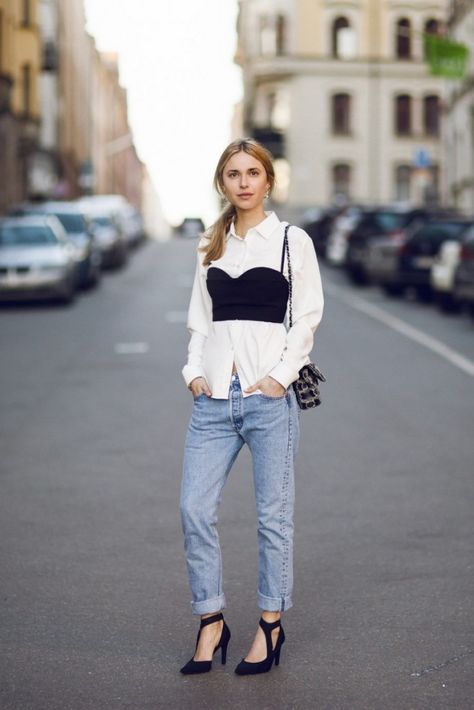 This season, corsets are taken to the next level The post How To Wear Corset Trend appeared first on Career Girl Daily. Bustier Over Shirt, Top Over Shirt, Look Jean, Black Bustier, Outfit Chic, Wear Crop Top, Crop Top Dress, Boyfriend Jean, Outfit Jeans