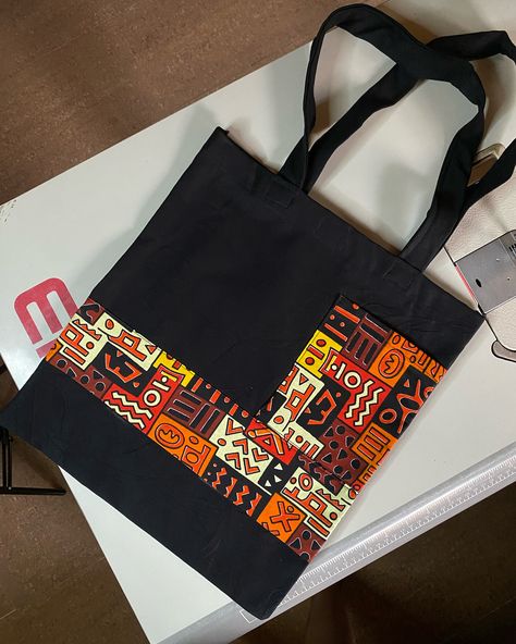 Afrocentric tote bag design made for a customer Price N4500 #totebag #totesteeshub #weddingsouvenirnigeria #topqualitytotebags #totebagsinabuja #madeinabuja #brandsouvenir #brandedtote #weddinggiftitems #weddingsouvenirs #weddingtotebagdesigns #totebags #totebagsforstudent Bags Inspiration, Ankara Bags, Handmade Fabric Bags, Diy Hair Accessories Ribbon, African Bag, African Designs, Bags Ideas, Denim Bags, Bags Diy