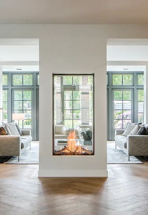 Fireplace In Center Of Room, Indoor Open Fireplace, Double Sided Fireplace Inside And Outside, Double Height Dining Room, Double Sided Fireplace Bedroom, Double Sided Fireplace Ideas Room Dividers Fire Places, 2 Sided Fireplace Living Room, Double Sided Glass Fireplace, Fireplace Dividing Living And Dining