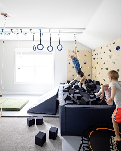 Foam pit FUN! 💥 Did you know we sell foam pits and foam cubes on our website? Foam pits (as you’ve likely realized by now!) are one of our favorite playroom elements. They can serve as a landing zone for climbing walls or monkey bars or just a fun place to play. Kids can’t resist running and diving (or trampoline launching themselves!) into them! Start thinking about these for holiday TODAY!! They take 4-6 weeks for delivery so don’t delay! ⏰ Multiple sizes and color options available. Li... Playroom Soft Play, At Home Rock Climbing Wall, Indoor Playroom Playground, Diy Foam Pit, Basement Kids Hangout, Black Playroom, Kids Rec Room, Climbing Room, Gym Playroom