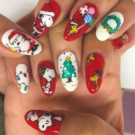 Fun Winter Nails 2023-2024: 19 Playful Ideas - thepinkgoose.com Snoopy Christmas Nail Art, Peanuts Christmas Nails, Christmas Nails Characters, Character Christmas Nails, Christmas Snoopy Nails, Snoopy Nails Christmas, 7 Cartoon Characters, Charlie Brown Christmas Nails, Snoopy Christmas Nails