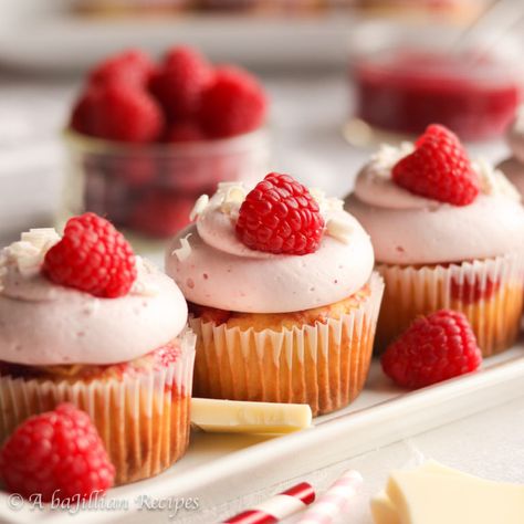 White Chocolate Raspberry Cupcakes - A baJillian Recipes Chocolate Raspberry Buttercream, White Chocolate Raspberry Cupcakes, Fresh Raspberry Sauce, Lindt White Chocolate, Chocolate Raspberry Cupcakes, White Chocolate Cupcakes, Raspberry Cupcakes, Raspberry Buttercream, White Chocolate Bar