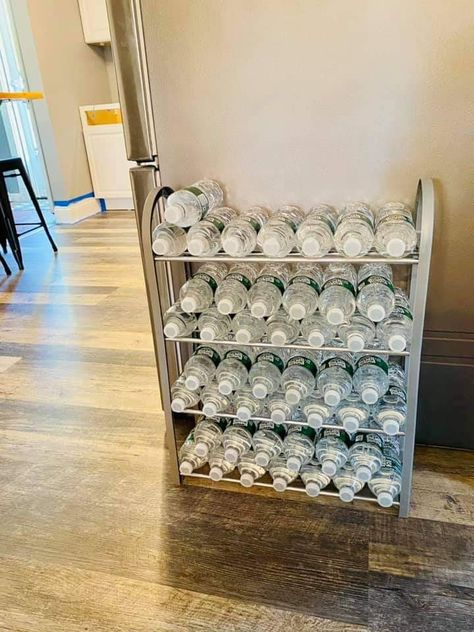 Bottled Water Storage Ideas, Bottled Water Storage, Drink Storage Ideas, Bottle Storage Kitchen, Food Stockpile, Larder Storage, Easy House Cleaning, Water Bottle Organization, Small Pantry Organization