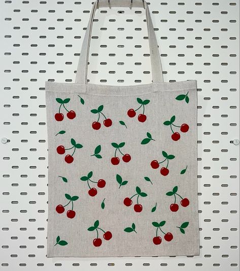 Canvas tote bag with scattered cherry design Toot Bags, Cherry Tote Bag, Diy Christmas Hats, Eco Bag Design, Creative Tote Bag, Diy Tote Bag Design, Handpainted Tote Bags, Bag Painting, Tods Bag