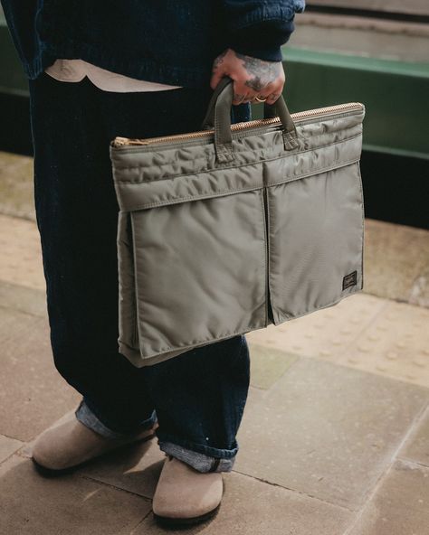 Inspired by the US Air Force “MA-1” flight jacket that is both durable and lightweight, Porter Yoshida's Tanker series has become synonymous with the brand since its introduction in 1983. Explore the selection of luxury military-inspired luggage styles online now.   #nigelcabourn #nigelcabournengland #porteryoshida #porterbags #portertanker #madeinjapan  #menswear #menswearstyle Porter Bag Yoshida, Japan Bag, Porter Bag, Nigel Cabourn, Day Backpacks, Porter Yoshida, Flight Jacket, Us Air Force, Large Shoulder Bags