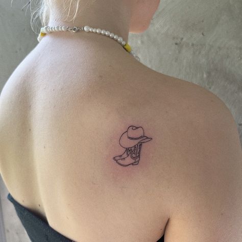 Cowprint Cowboy Hat Tattoo, Dainty Southern Tattoos, Cowboy Boot With Hat Tattoo, Cowboy Boot Stamp Tattoo, Cowboy Boots With Hat Tattoo, Cowboy Hat Finger Tattoo, Pink Cowboy Hat Tattoo, Cowboots Tattoo, Cowboy Hat And Boot Tattoo