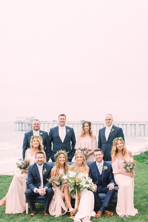 Seaside La Jolla Wedding with Spring Pastels #springweddingflowers #bohobridesmaiddresses #coastalweddingvenues Blush And Navy Bridal Party, Navy And Pink Groomsmen, Groomsmen With Pink Bridesmaid, Pink And Blue Wedding Party, Blush Bridesmaid Dresses With Groomsmen, Bridesmaid Dresses With Navy Suits, Blush Groomsmen Attire, Navy Suits Groomsmen, Blush Wedding Party