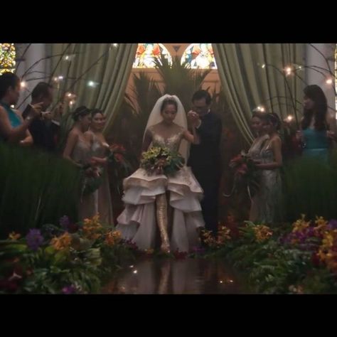 In a new Crazy Rich Asians trailer the film adaptation of Kevin Kwans 2013 novel watch a preview of what looks like the perfect summer rom-com. #asianfashion #rich #asian #fashion Crazy Rich Asians Wedding Aisle, Crazy Rich Asians Wedding Dress, Crazy Rich Asians Wedding, Bridal March, Asian Inspired Wedding, Tv Weddings, Asian Wedding Dress, Iconic Weddings, Crazy Rich Asians