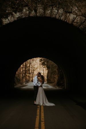 Newlyweds embracing under a bridge during their Sevierville, TN elopement. Gatlinburg Elopement, Smoky Mountain Elopement, Gatlinburg Wedding, Magical Mountain, Gatlinburg Weddings, Red River Gorge, Hocking Hills, Gatlinburg Tn, Mountain Elopement